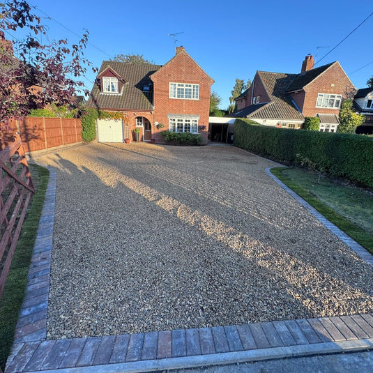 Gravel driveway with grids