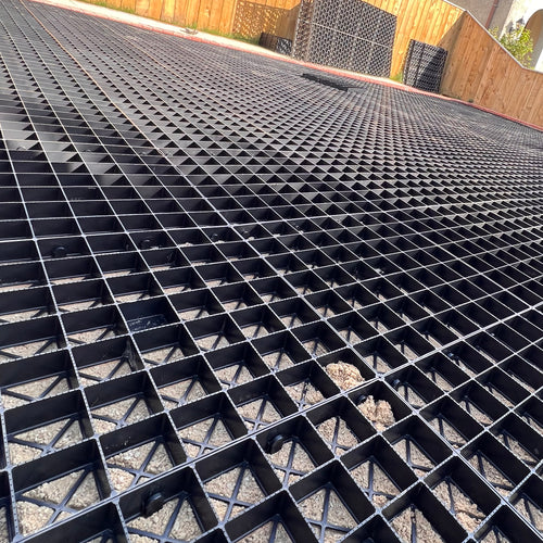 Interlocked gravel grids for a driveway