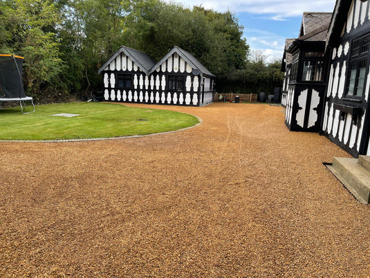 Tudor Style property with gravel driveway